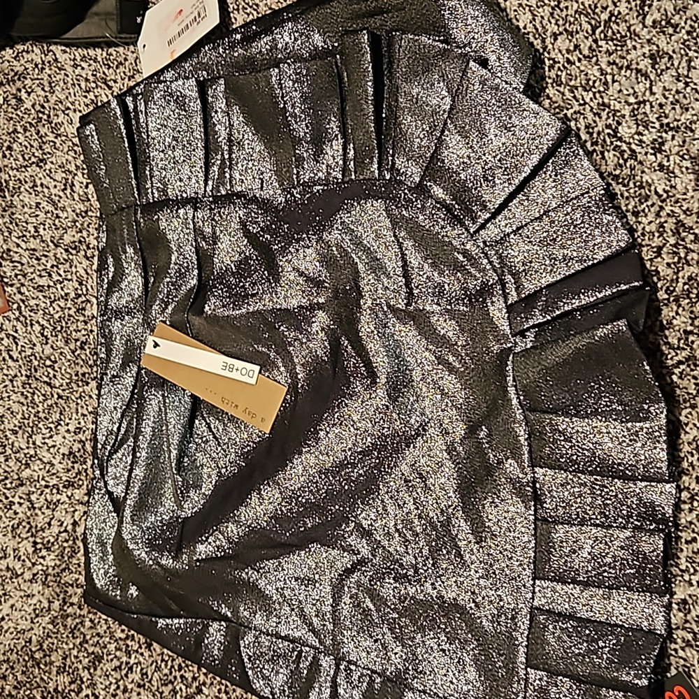 Women's size L skirt. New with tag. Short, sexy, good for a date night.